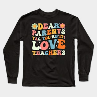 Groovy Dear Parents Youre It Last Day Of School Teacher Long Sleeve T-Shirt